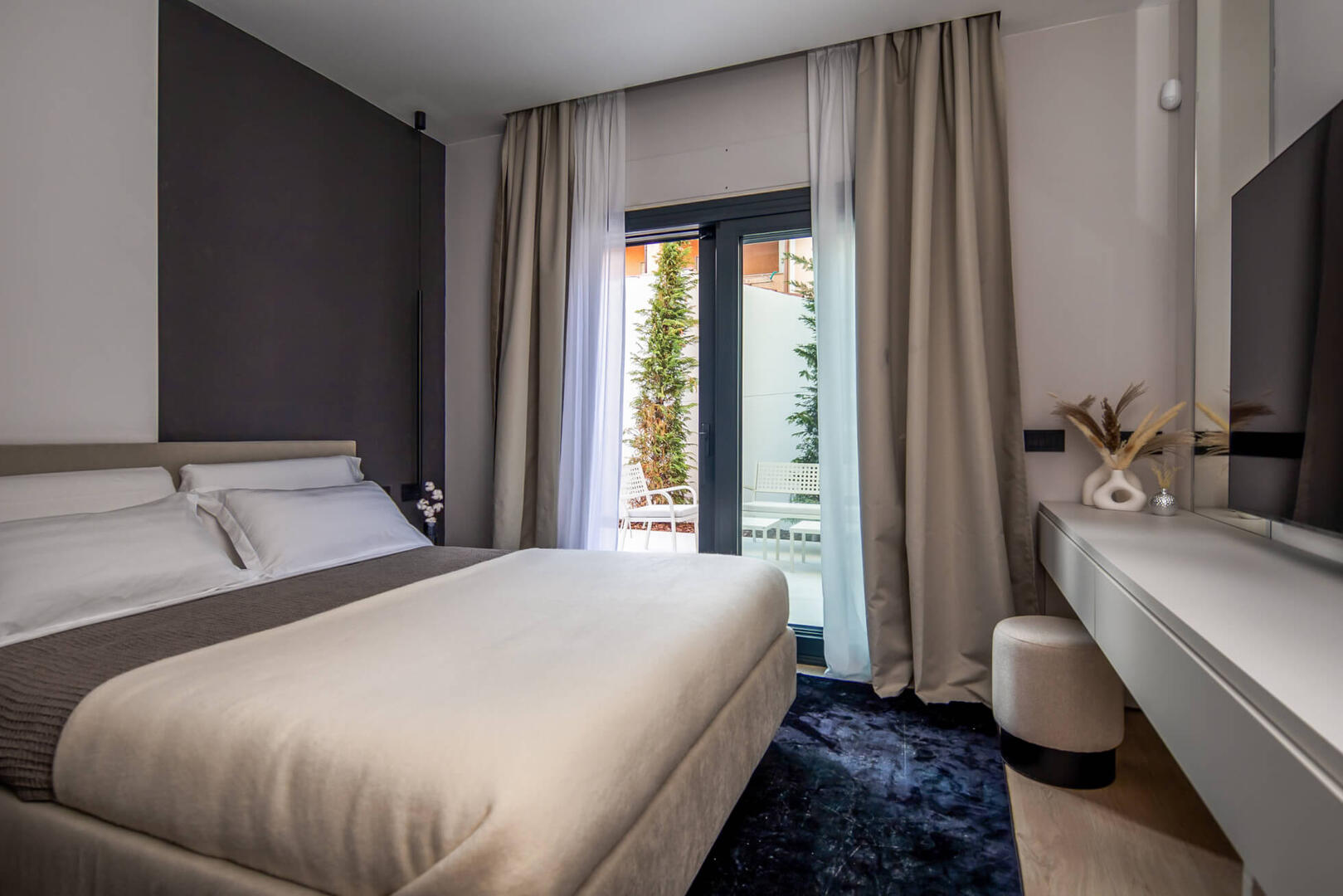 Spacious Bedroom with comfy king-size bed and premium linens